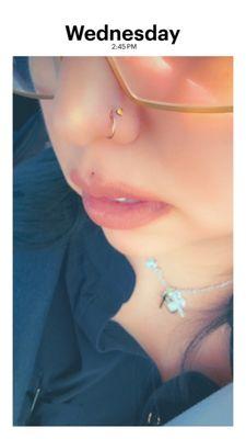 Gold Heart nose stud piercing