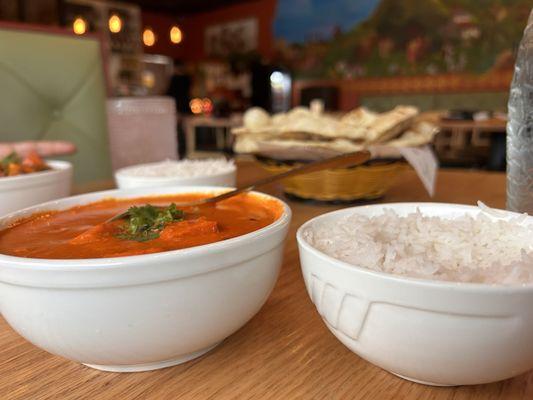 Chicken Tikka Masala, rice, and a beautiful bowl of garlic naan- wonderful spice and presentation