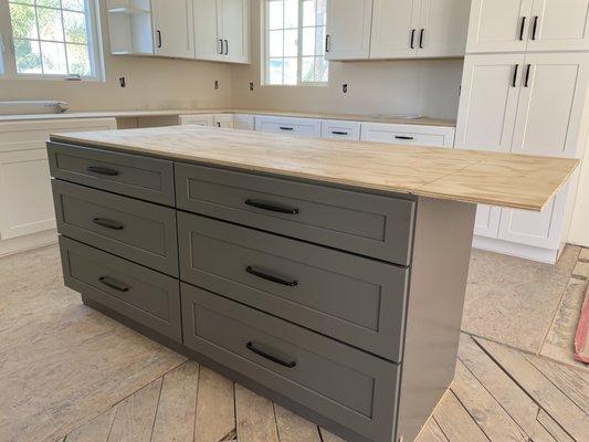 Island cabinets installed (pre-countertop).