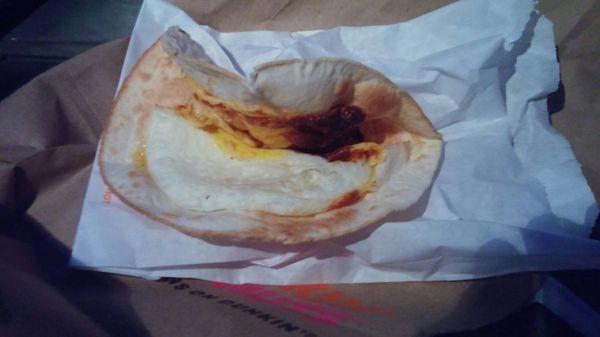 This was supposed to be an Egg n Cheese Wrap. Didn't know it looked like this....all burnt until I got all the way to work.