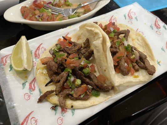 Carne Asada tacos with their pico de gallo