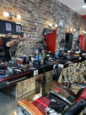 Interior of the barbershop on a Sunday early afternoon, while my son got his hair cut.