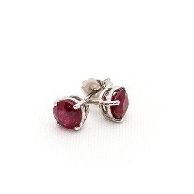 Ruby Stud Earrings by Pierre.