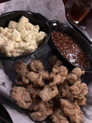 Fried oyster platter with beans and potato salad