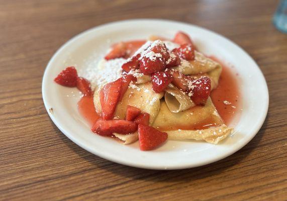 Two a la cart Strawberry Vanilla Crepes.