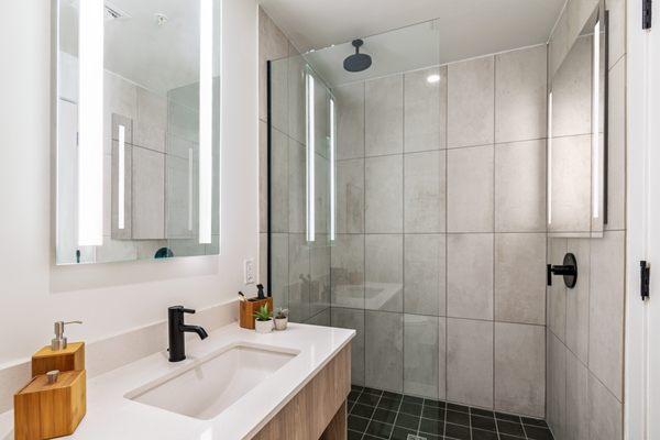 Rainfall showers and mirrors that have LED lighting