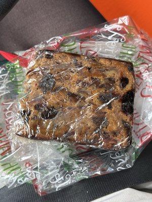 A Christmas time fruit cake slice.  Moist , fruity and boozy. Delish.