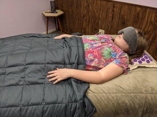 Lotus Acupressure Mat with weighted blanket.