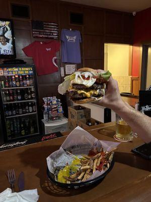 Double burger loaded with bacon with fresh cut fries