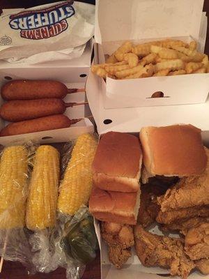 Jalapeño corn dog, crinkle cut fries, fried chicken, and buttery corn on the cob