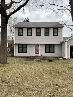 Front of house after!!! We also replaced the storm door!