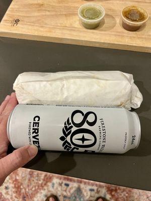 Burrito next to a tall can for reference. This baby is HUGE!