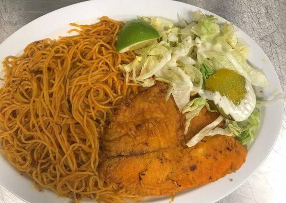 Pasta made with flavorful Somali sauce with a side of fried tilapia fish. #tastesomalia #yummy #foodporn