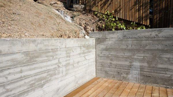 Retaining walls increase amount of usable space in a yard. We provide retaining wall design services.