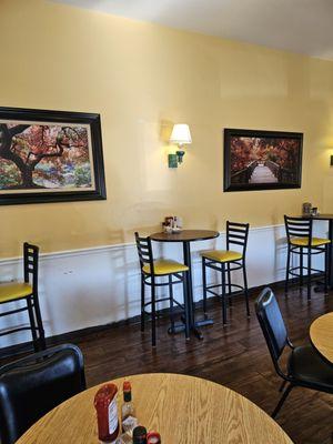 Another seating area with hardwood floors.