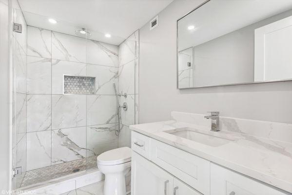 Full bathroom remodel (shower wall, shower base from scratch, flooring, countertop, vanities, mirrors, full electrical, plumbing)