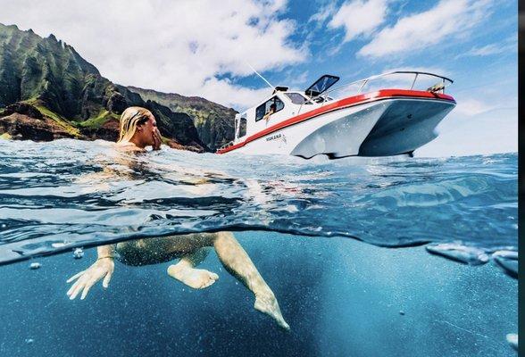 Makana taking a swim in front of Kalalau