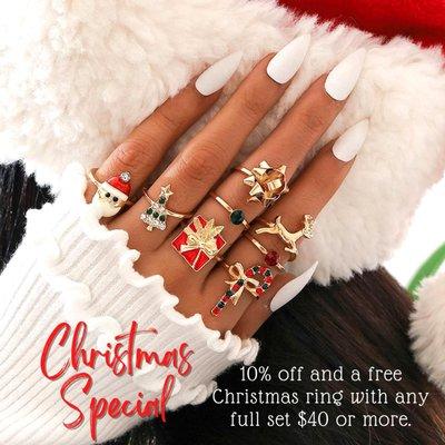 10% Off until Christmas and a free Christmas ring with any manicure or full set $40 or more.