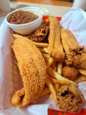 Catfish, fries, red beans and rice and fried oysters.