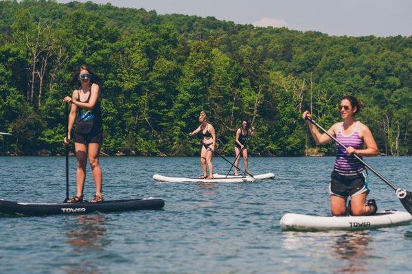 Try stand up paddle boarding when you visit Eureka Springs this summer!