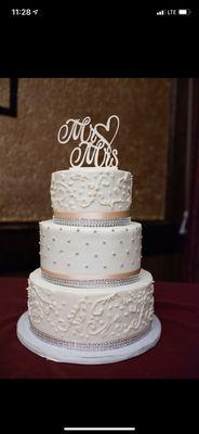 Wedding cake. Bottom & top tier Vanilla w/ Marion Berry Filling, Middle tier has strawberry with real strawberry filling.