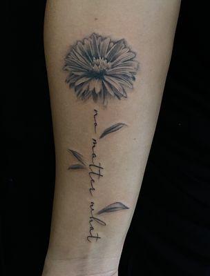 Realistic flower tattoo by Ash