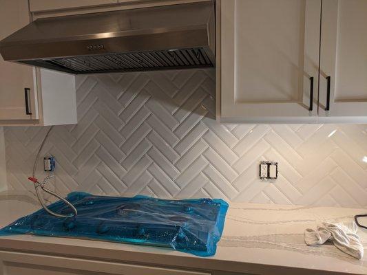 Herringbone pattern back splash