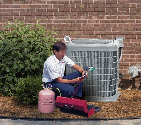 Air conditioning technician performing service on AC equipment