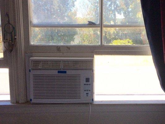 Window AC Installation with Plexiglass in West Hollywood.