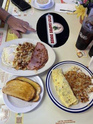 corn beef hash omlette sourdough toast  ham 2 eggs hashbrowns biscuit & gravy