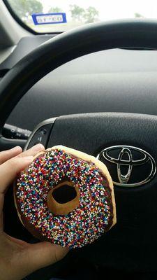 Chocolate donut with sprinkles