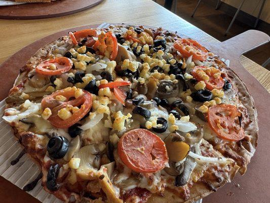 Cauliflower crust garden pizza