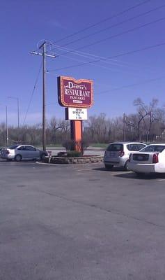 Parking lot and restaurant sign.