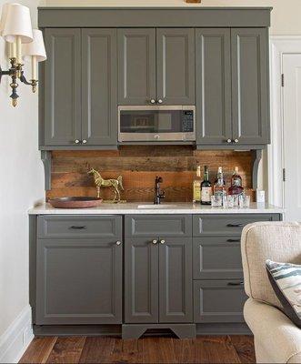 You can add beautiful little touches to any of your spaces using our barn wood.  This wet bar backsplash is case in point!