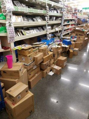 Came in for couples picture frames and this is what the aisle looked like. Hard to find anything in this mess....