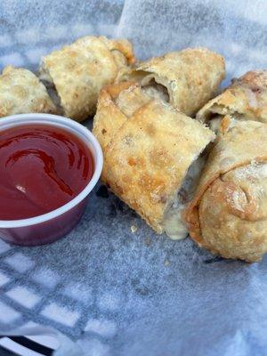 Steak and cheese egg rolls