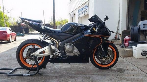 06 honda cbr prowder coated wheels and fresh paint with orange pin stripe