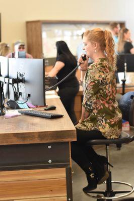 Our receptionist hard at work at the reception desk