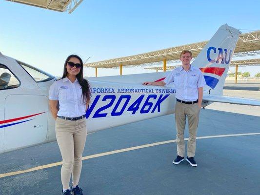 CAU student poses with his CFI after his first solo flight.