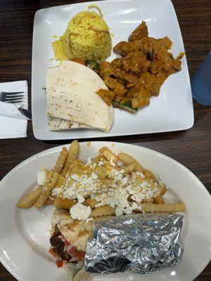 Gus Spicy Chicken (top) and Falafel Wrap with side of greek fries (bottom)