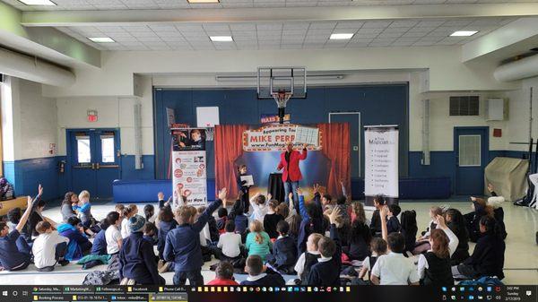 kids captivated as they learn magic at school assembly