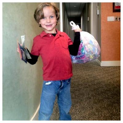 This young man was so excited to donate his candy to our troops... and he even threw in a few tooth brushes as well!