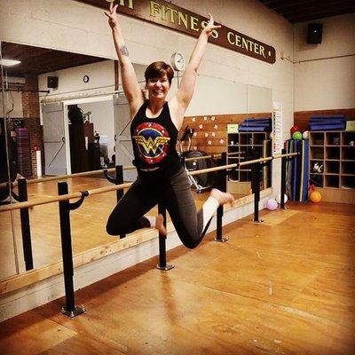 Instructor and Director of Operations LaRae McCurry Jumping for Joy about her Barre style class!