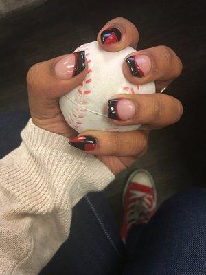 Acrylic full-set with three square tips on my middle, ring, and thumb, two stiletto tips on my pointer and pinky finger with gel polish.