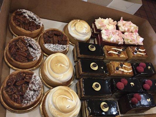 Maple Pecan Tart, Lemon Meringue Tart, Opera, Raspberry chocolate, Red Velvet, 3 milk cake.    My son's birthday