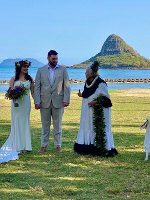 Aunty Tutu officiating a wedding at Kualoa Regional Park on O'ahu. The wedding couple flew Aunty to O'ahu to officiate their wedding.