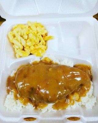 Smothered Chicken Breast with macaroni and cheese