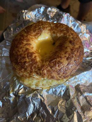 Egg and cheese Asiago bagel sandwich