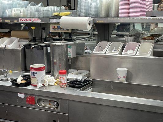 Trash on the ice cream prep counter