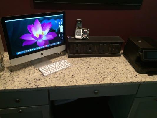 Additional desk area to match kitchen granite.